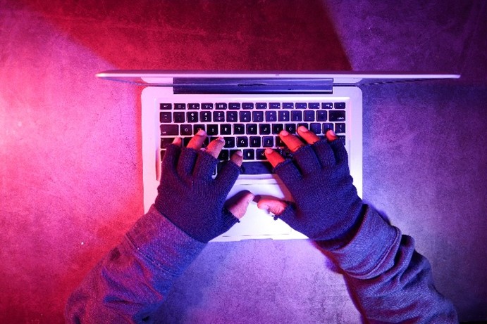 Cybercriminal hacking into networks
